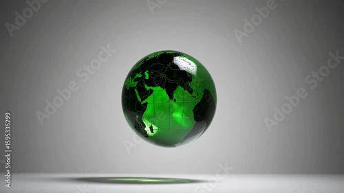 Glass globe model of planet Earth isolated on plain white background with clipping path