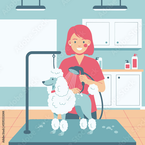 A groomer washes a poodle with a shower head in a bright grooming salon.