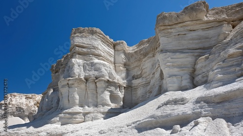Wallpaper Mural Striking white rock formations with layered textures under a clear blue sky Torontodigital.ca