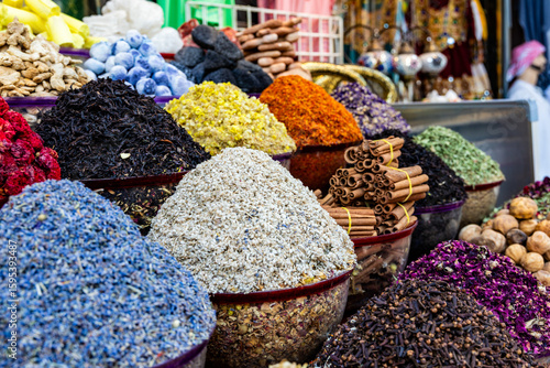 Photography Vibrant Spices and Dried Flowers in a Traditional Market