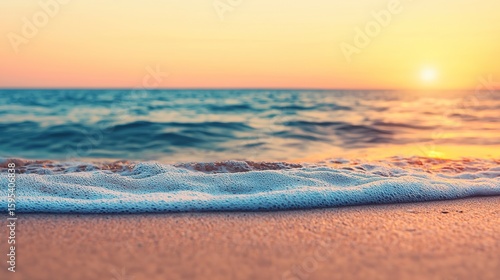 Fototapeta Naklejka Na Ścianę i Meble -  Soft focus serene beach sunset background, warm colors