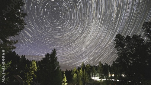 Long exposure image of star trails in the night sky at Garnet Ghost Town in Montana, U.S.A., photographed in the evening .