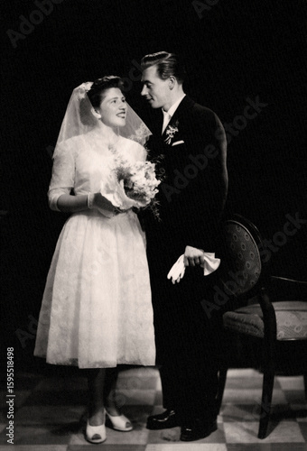 Fotografie Slovakia - circa 1959: Vintage portrait of bride and groom on their wedding day
