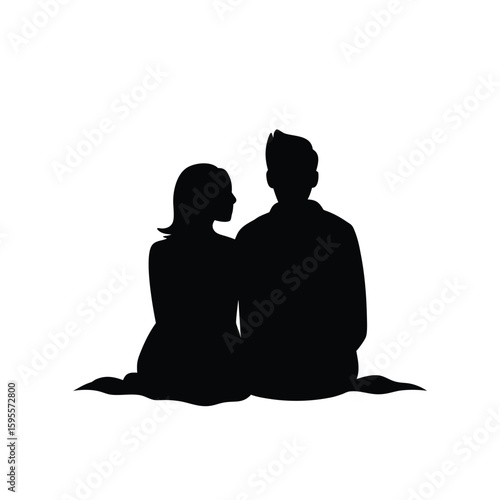 Romantic silhouette of a couple gazing upwards at the night sky