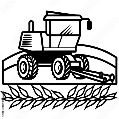 Combine Harvester Silhouette in Field