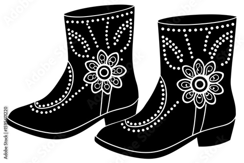 Decorative beaded black boots with floral design on white background