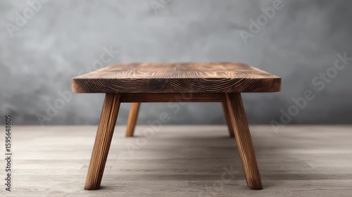 Wooden table furniture with natural texture and angled legs on floor