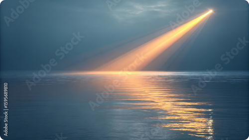 Golden light beam over calm ocean water reflection
