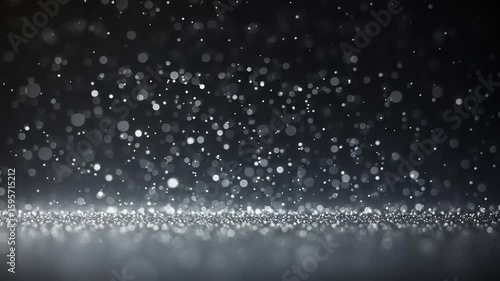 Silver glitter particles bokeh background