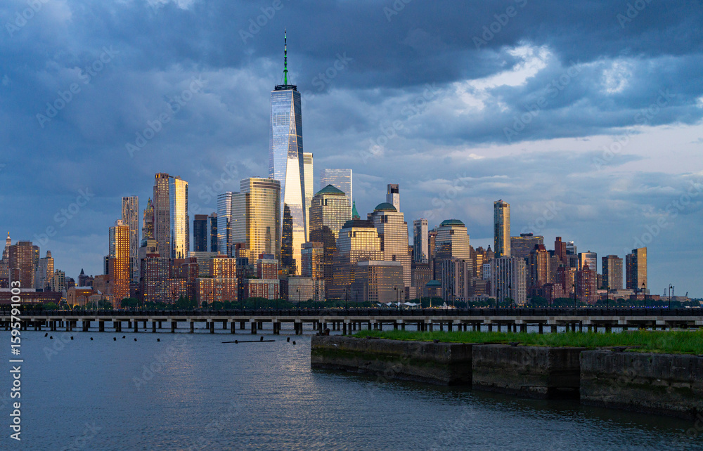 Obraz premium New York City at night. NYC cityscape with skyscrapers. Panoramic of New York City skyline. Manhattan skyline. New York and Hudson River. Downtown NYC. New York skyscrapers.