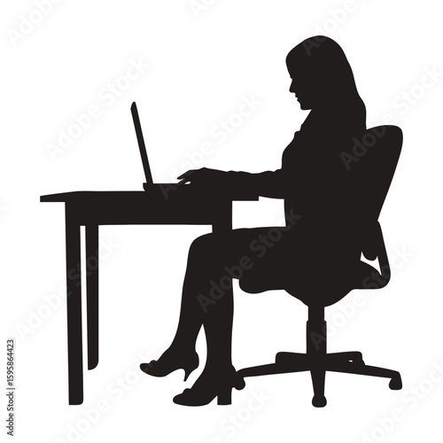 Silhouette of businesswoman working on a laptop