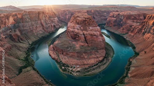 River loop in canyon under sunrise