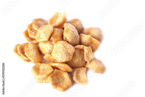 Wallpaper Mural A tempting pile of crispy caramel-coated snacks on a clean white background. Perfect for fun snacking moments, parties, or movie nights. Crunchy, sweet, and utterly irresistible — a treat for all ages Torontodigital.ca