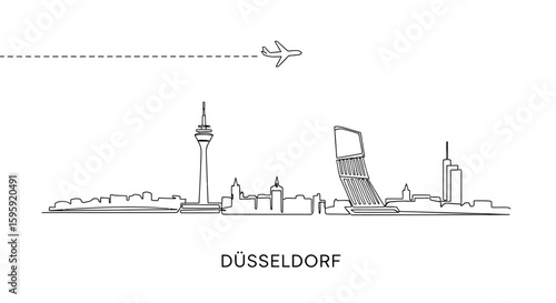 Dusseldorf skyline Plane flies above city.