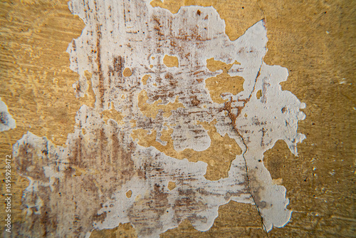 cracked yellow wall