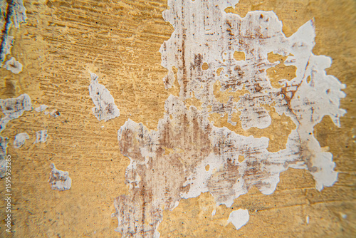 cracked yellow wall