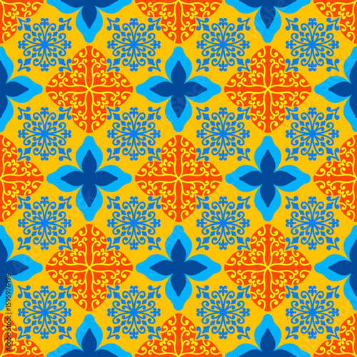 Interlocking pattern with blue floral motifs and red diamond shapes on a yellow background