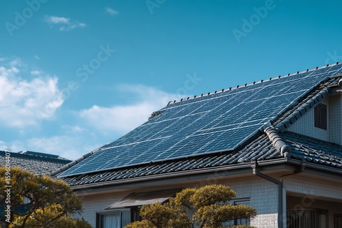 Wallpaper Mural Solar panels convert sunlight into energy on a traditional Japanese rooftop under a clear blue sky, showcasing sustainability in housing Torontodigital.ca