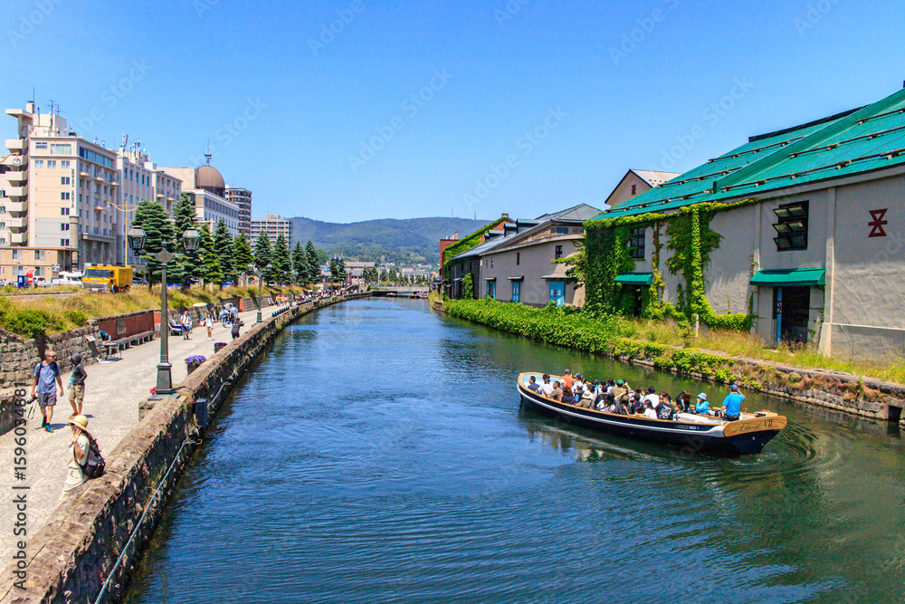 Obraz premium Scenic Boat Ride on Otaru Canal in Summer, Hokkaido, Japan