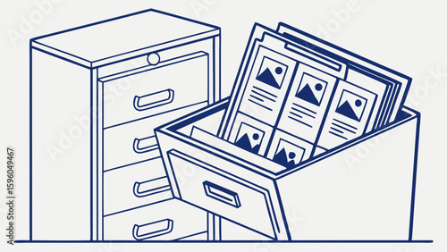 Open File Cabinet Drawer with Image Files and Folders.