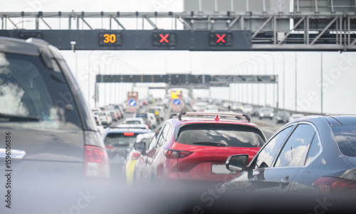 Auckland harbour bridge lane closure and traffic jam due to strong wind. Auckland. New Zealand.