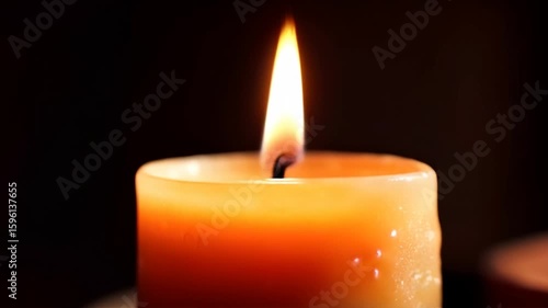 Candle Burning Gently in Dark Room close up