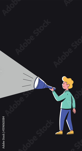 Young boy holding a flashlight in the dark illuminating the way forward searching for something exciting during the night