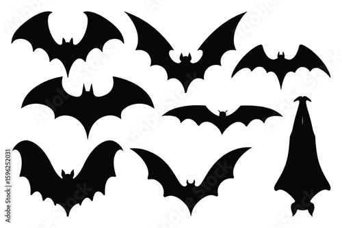 Collection of various flying bat silhouettes against a white background for halloween