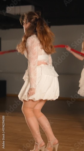 Wallpaper Mural An Elegant Dance Performance Featuring Dancers Dressed in a Chic White Dress Ensemble Torontodigital.ca