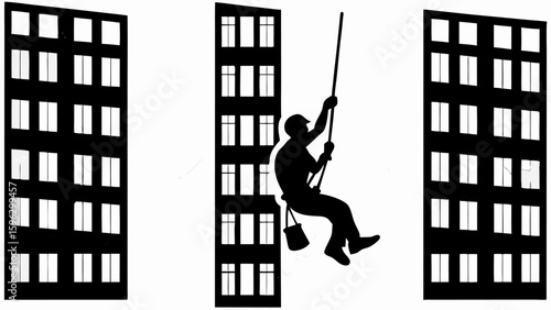 Silhouette of window cleaner hanging from rope between buildings with multiple windows displayed