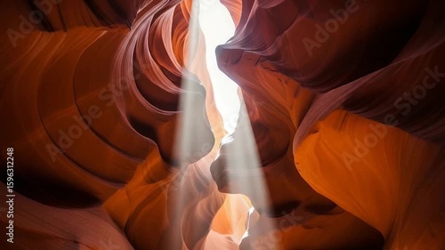 Sunlight streams through the sandstone formations of Antelope Canyon.