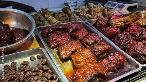 Local Chinese market food selling braised pork belly and rice