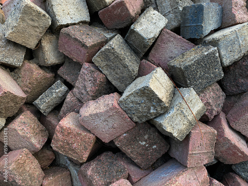 Wallpaper Mural Pile of left over pavers, flooring or concrete block paving, cube shape, red and grey colors Torontodigital.ca