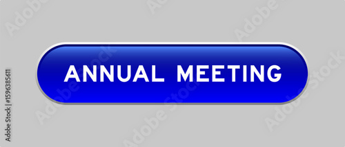 Blue color capsule shape button with word annual meeting on gray background