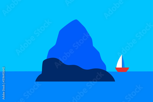 limestone rock rising from blue water boat nearby