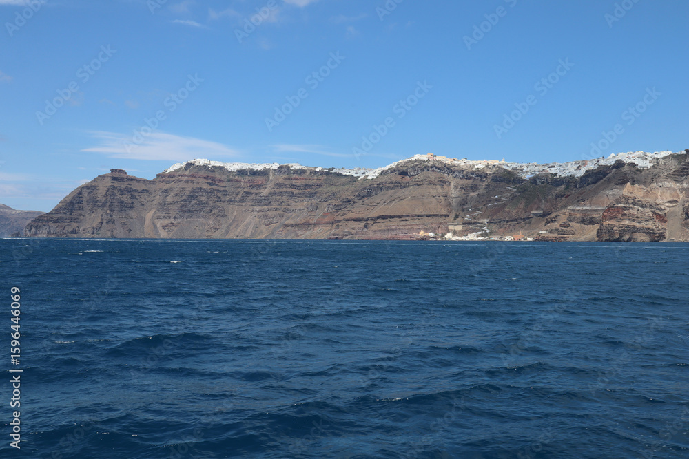 Greek town Fira, view from the sea, Santorini, Greece Greek town Fira, view from the sea, Santorini, Greece