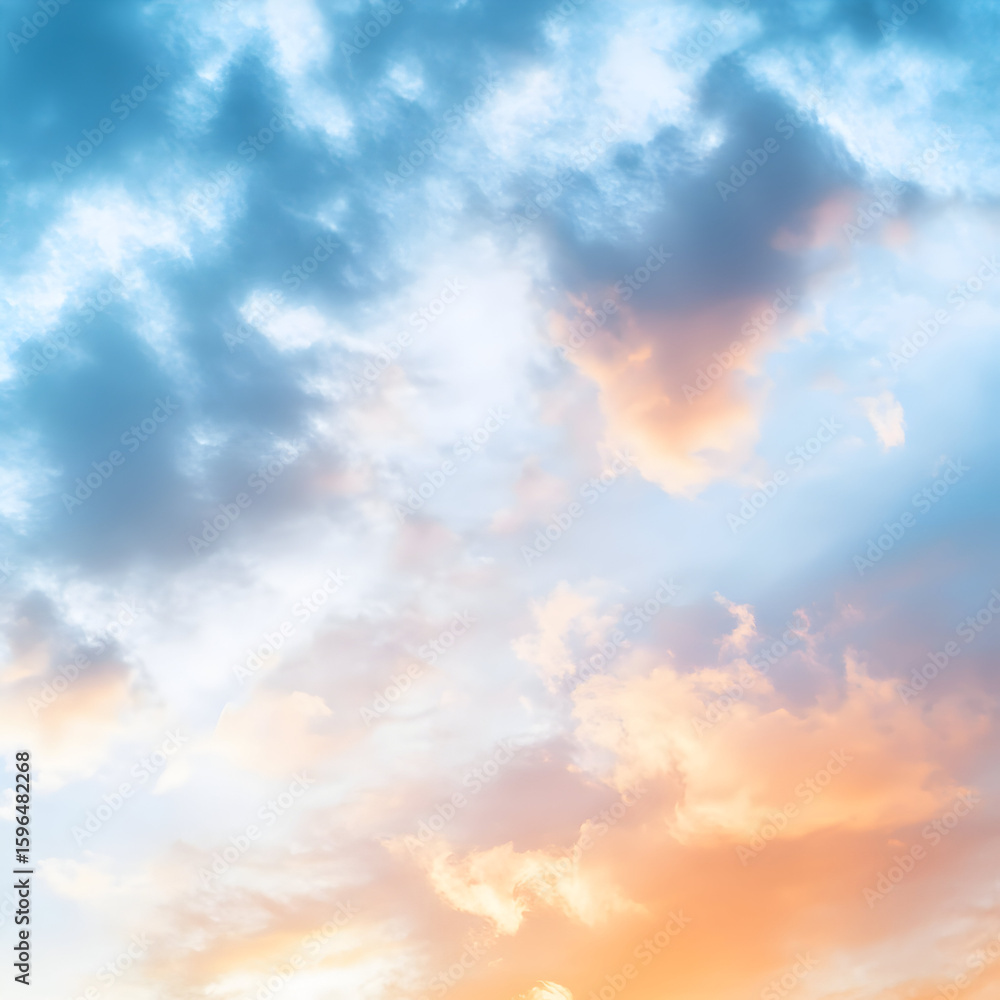Obraz premium Pastel colored clouds in the sky at sunrise or sunset.