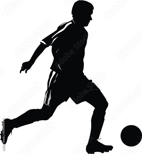 Silhouette of a Soccer Player Actively Dribbling a Ball Mid-Play