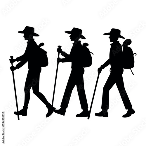 Three hikers with backpacks and trekking poles walking together