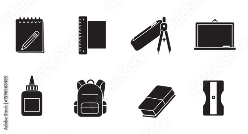 Black and white school supplies set featuring notebook ruler pencil and other stationery items