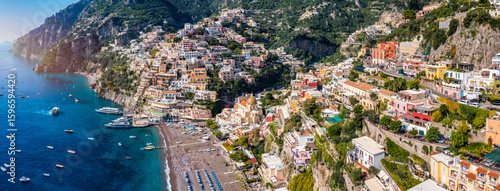 Aerial view of Positano with comfortable beach and blue sea on Amalfi Coast in Campania, Italy. Positano village on the Amalfi Coast, Salerno, Campania. Beautiful Positano, Amalfi Coast in Campania.