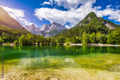 Fototapeta Naklejka Na Ścianę i Meble -  Jasna lake with beautiful mountains. Nature scenery in Triglav national park. Location: Triglav national park. Kranjska Gora, Slovenia, Europe. Mountain lake Jasna in Krajsnka Gora, Slovenia.