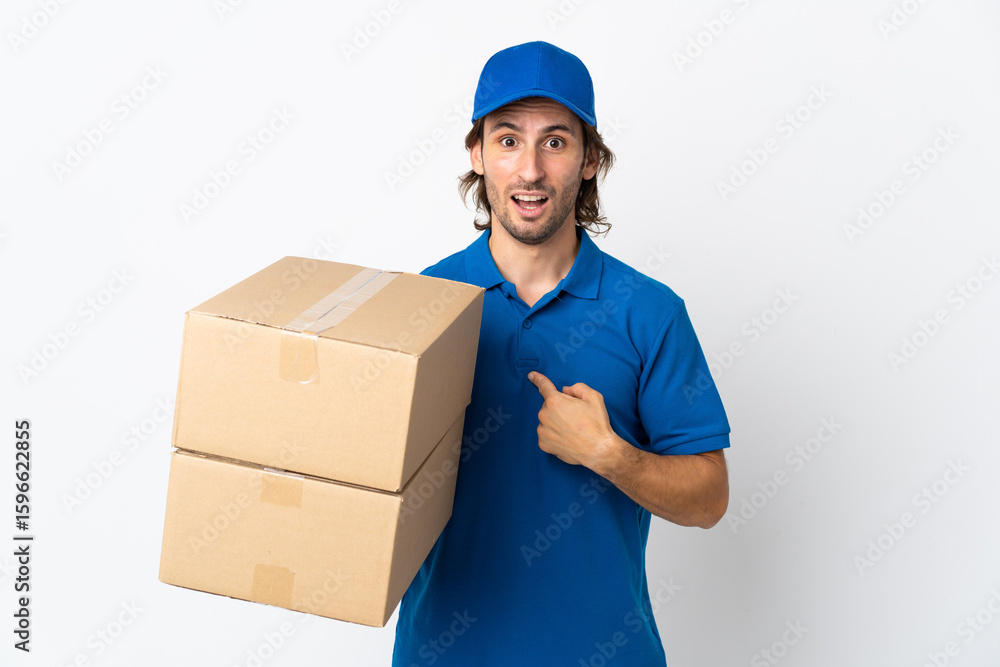 Delivery man isolated on white background with surprise facial expression Delivery man isolated on white background with surprise facial expression