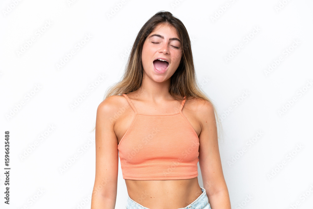 Obraz premium Young caucasian woman isolated on white background shouting to the front with mouth wide open