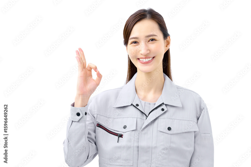 OKサインをする作業服の女性 点検 確認 作業員 OKサインをする作業服の女性 点検 確認 作業員