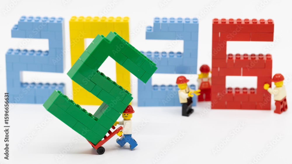 Naklejka premium Hong Kong - July 21 2025: workers set up the new year 2026 wording