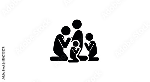 Silhouette of a family in prayer with children and adults kneeling together