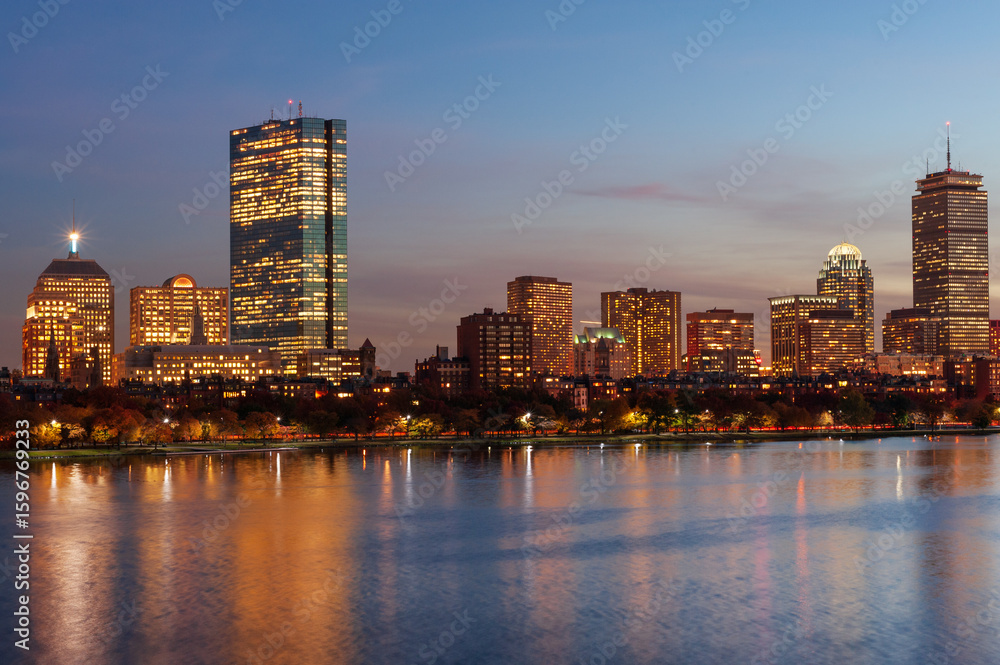 Fototapeta premium Affluent Back Bay neighborhood skyline and Charles river at night, Boston, Massachusetts, USA