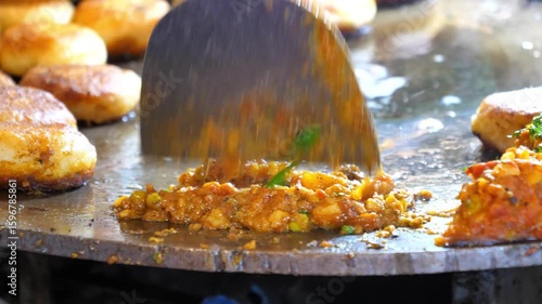 Street Vendor Preparing Aloo Tikki Chaat on Tawa 