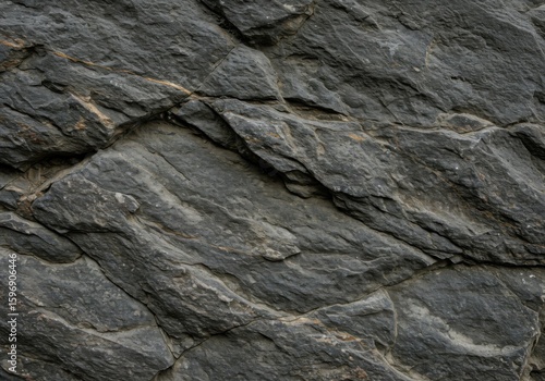 Grungy stone texture in monochrome tones for raw backgrounds